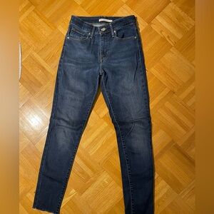 Levis dark blue skinny jeans. Size 25